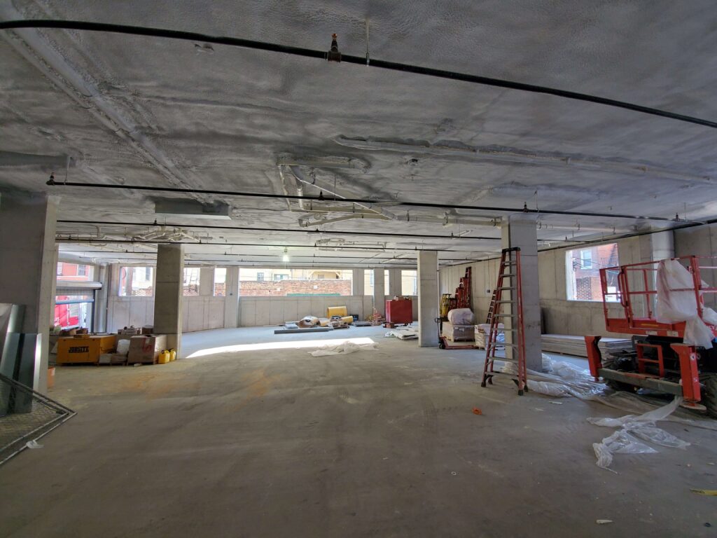 spray foam insulation in the ceiling of a commercial building