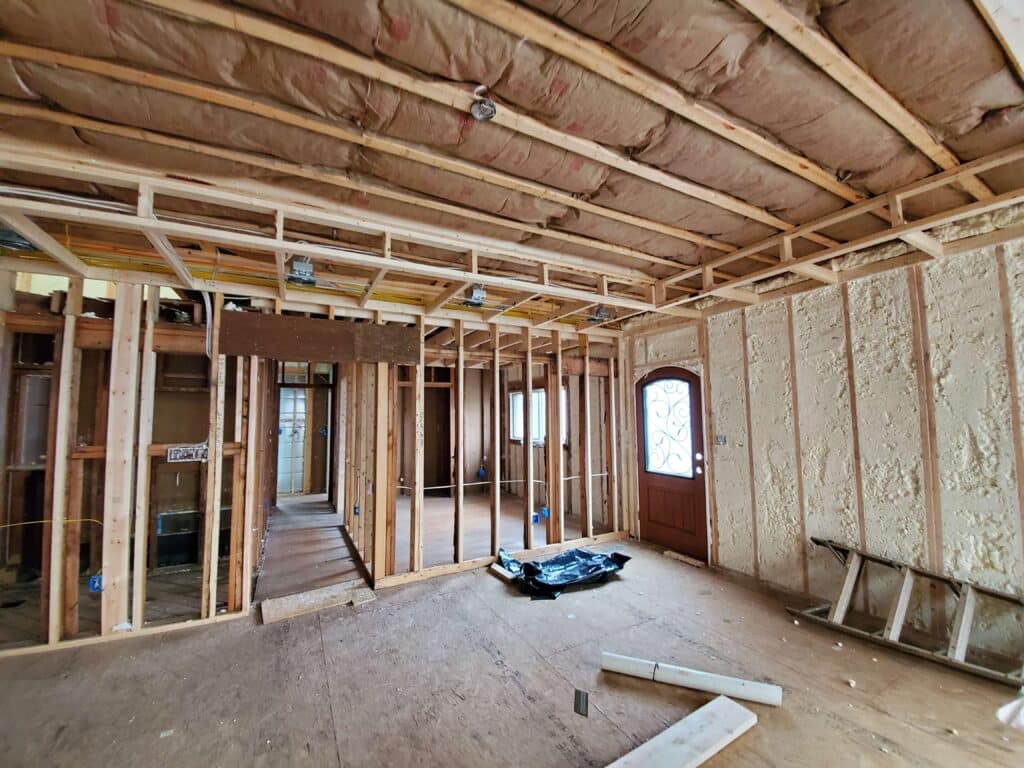 whole home insulation being installed on the interior
